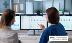 Dell Technologies - Two people viewing healthcare data on screen